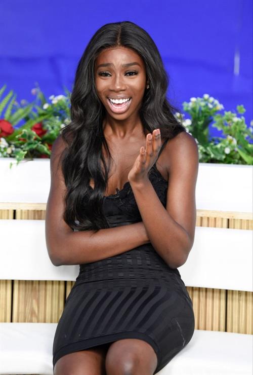 Yewande Biala Pictures Yewande Biala from Love Island sexy in a tight black dress on I Saw It First HQ .