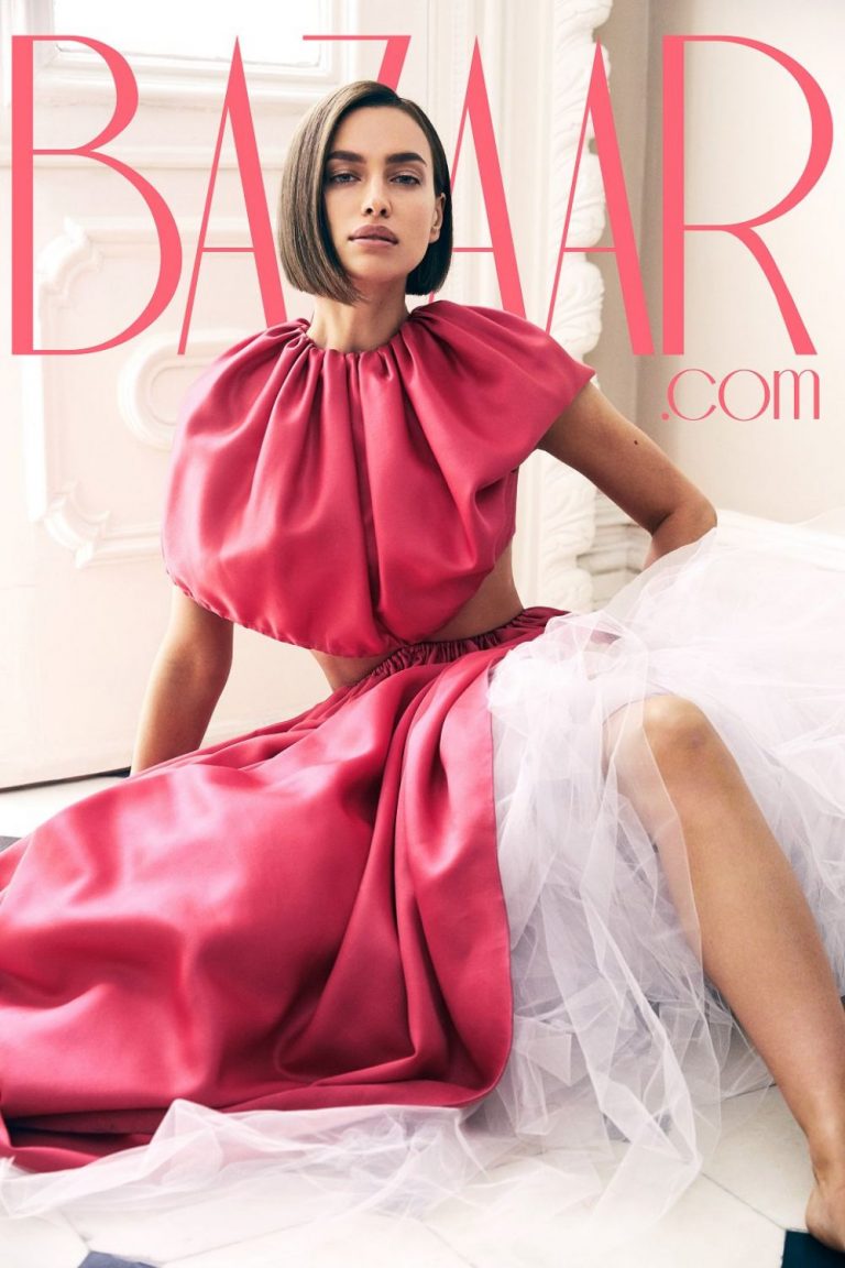 Irina Shayk Pictures Irina Shayk topless and sexy photo shoot for HarpersBazaar.com covering her nude boobs with her hands.