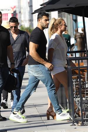 Britney Spears braless boobs in a see through blouse showing her nipples seen by paparazzi.


