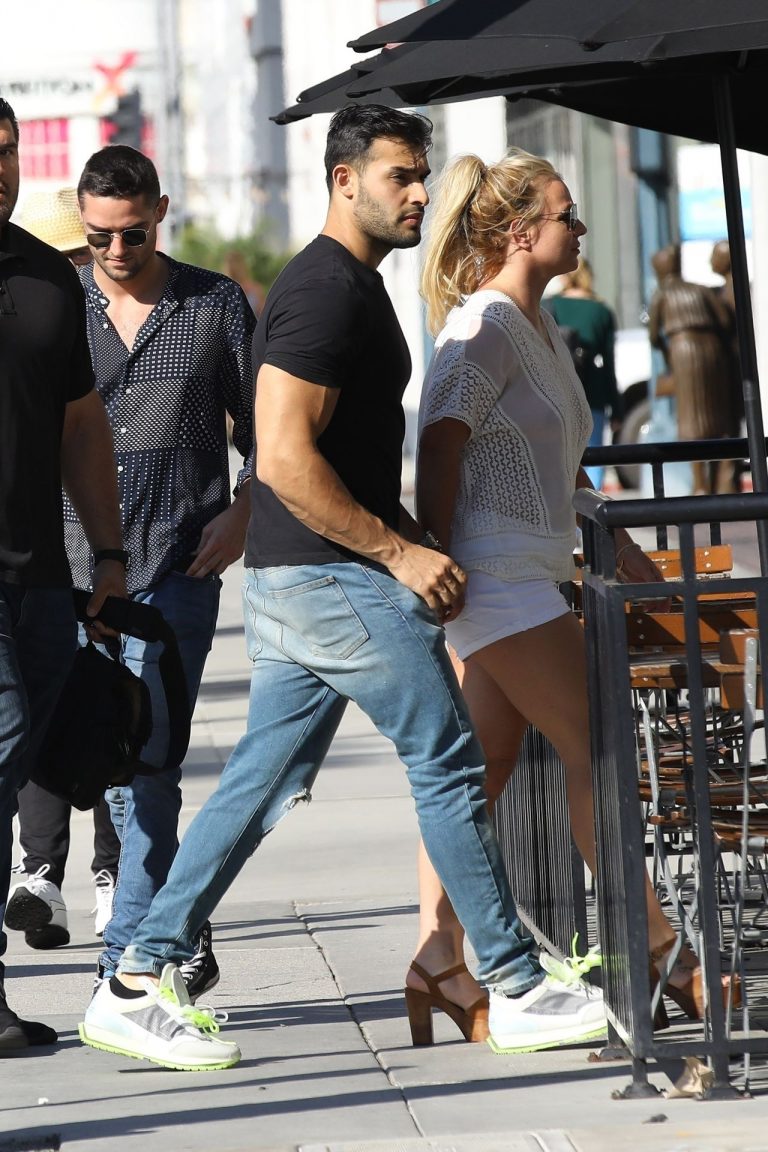 Britney Spears Pictures Britney Spears braless boobs in a see through blouse showing her nipples seen by paparazzi.