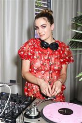 Chelsea Leyland braless boobs in a see through dress showing her nipples.



