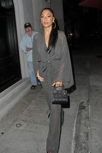 Nicole Scherzinger Pictures Nicole Scherzinger sexy in a see through outfit showing her braless boobs and ass seen by paparazzi.
