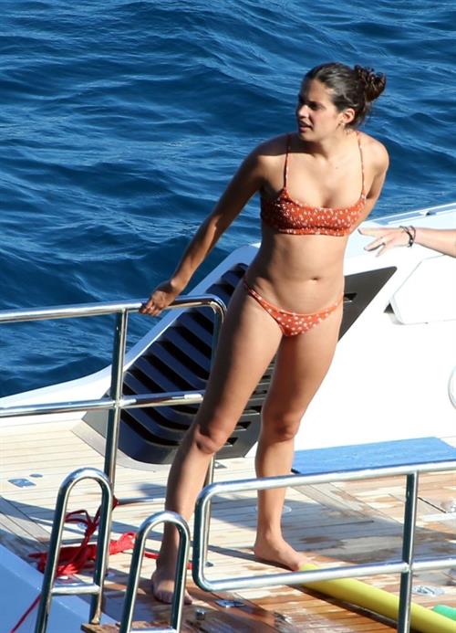 Sara Sampaio sexy ass and cleavage in a thong bikini seen by paparazzi.

