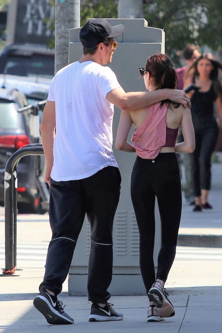Emma Roberts Pictures Emma Roberts sexy little ass and thigh gap in tight pants seen by paparazzi with Garrett Hedlund.