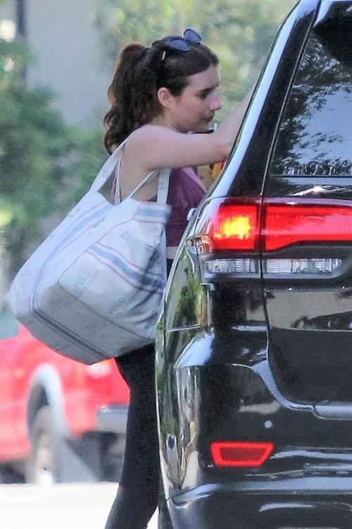 Emma Roberts Pictures Emma Roberts sexy little ass and thigh gap in tight pants seen by paparazzi with Garrett Hedlund.