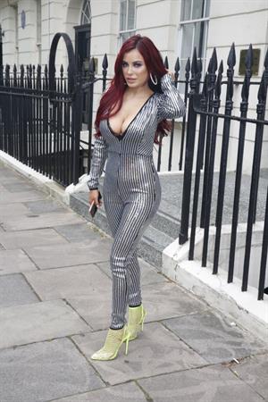 Carla Howe braless boobs showing nice cleavage in London.




