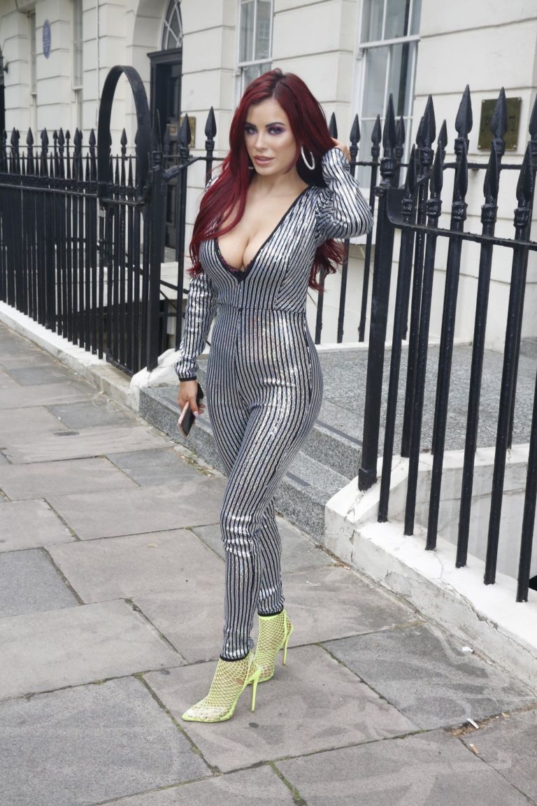 Carla Howe braless boobs showing nice cleavage in London.




