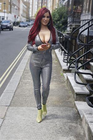 Carla Howe braless boobs showing nice cleavage in London.




