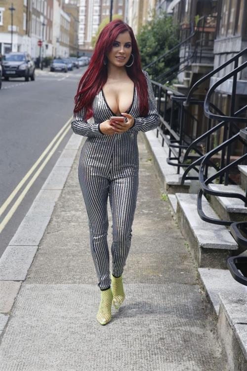 Carla Howe braless boobs showing nice cleavage in London.




