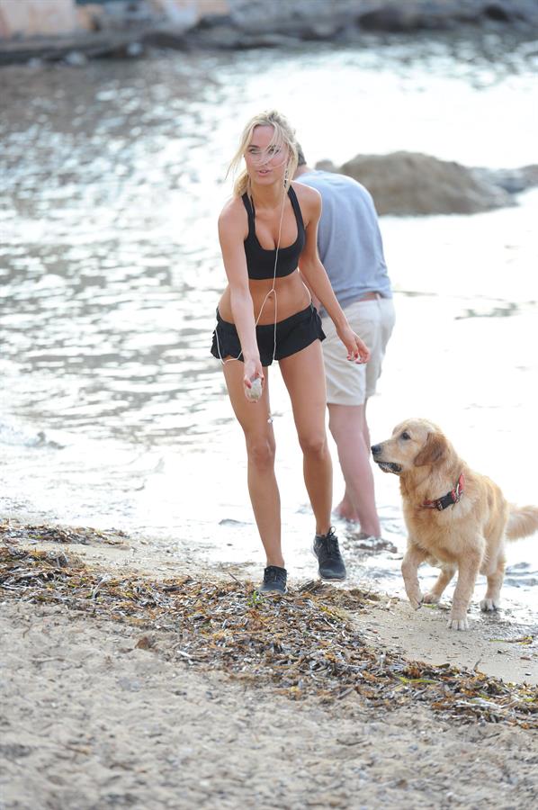 Kimberley Garner at the beach with her dog