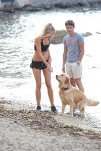 Kimberley Garner at the beach with her dog