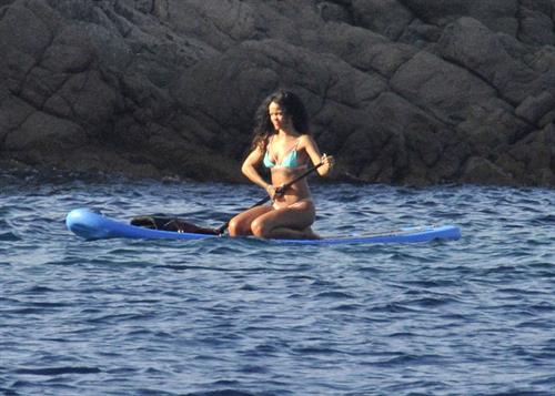 Rihanna paddle boarding