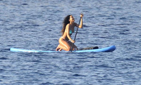 Rihanna paddle boarding