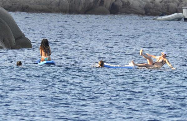 Rihanna paddle boarding