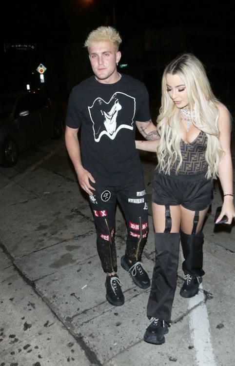 Tana Mongeau Pictures Tana Mongeau sexy cleavage in a revealing little outfit with Jake Paul.