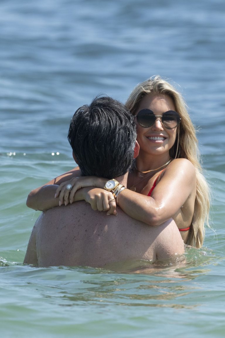 Sylvie van der Vaart Bikini Pictures Sylvie Meis sexy ass in a bikini at the beach with her new boyfriend at the beach seen by paparazzi.