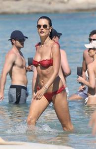Alessandra Ambrosio perfect model body in a sexy little thong bikini seen at the beach by paparazzi showing nice cleavage and ass.





















