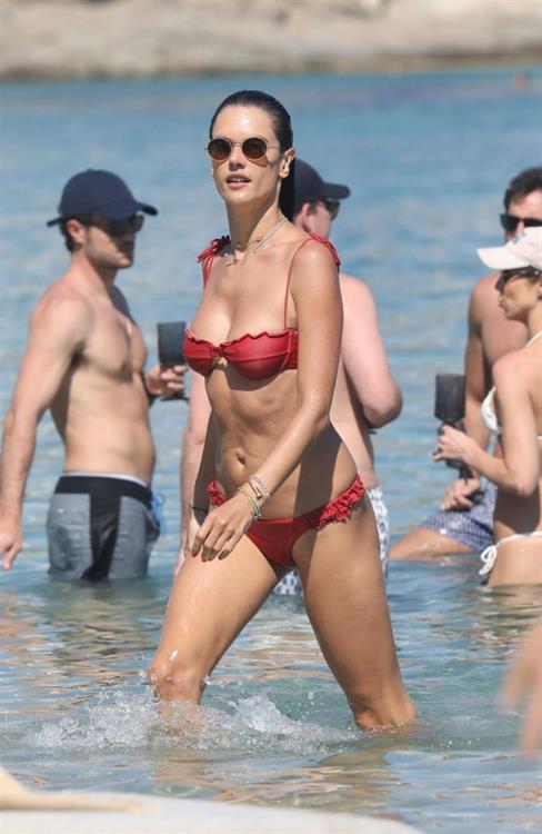 Alessandra Ambrosio Bikini Pictures Alessandra Ambrosio perfect model body in a sexy little thong bikini seen at the beach by paparazzi showing nice cleavage and ass.