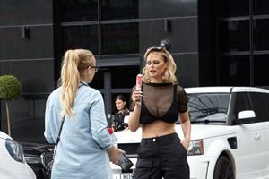 Rhian Sugden big boobs showing nice cleavage seen by paparazzi.
















