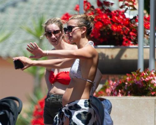 Ferne McCann Bikini Pictures Ferne McCann sexy in a bikini at the beach seen by paparazzi showing some cleavage.