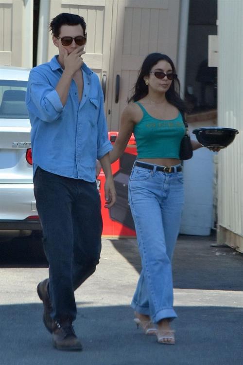 Vanessa Hudgens Pictures Vanessa Hudgens braless nipples pokies in a green top showing off her tits seen by paparazzi with Austin Butler.