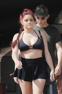 Ariel Winter paparazzi pictures in black bikini top and short skirt
