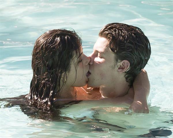 Camila Cabello and Shawn Mendes making out in the water seen by paparazzi kissing.





































