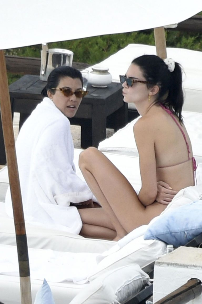 Kendall Jenner with Kourtney Kardashian sexy asses in thong bikinis seen by paparazzi.

