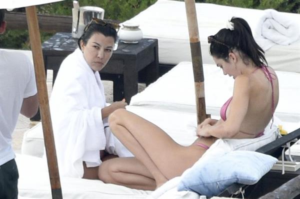 Kendall Jenner with Kourtney Kardashian sexy asses in thong bikinis seen by paparazzi.

