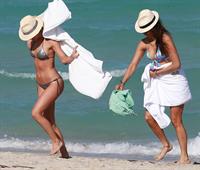 Nina Dobrev in a bikini