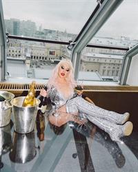 Christina Aguilera showing some nice cleavage with her big tits in a low cut outfit.












