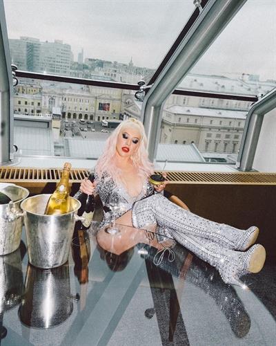 Christina Aguilera showing some nice cleavage with her big tits in a low cut outfit.












