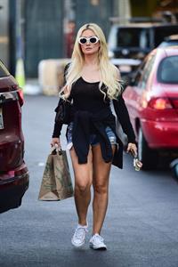 Holly Madison braless boobs in a see through black top seen by paparazzi showing off her big boobs.




