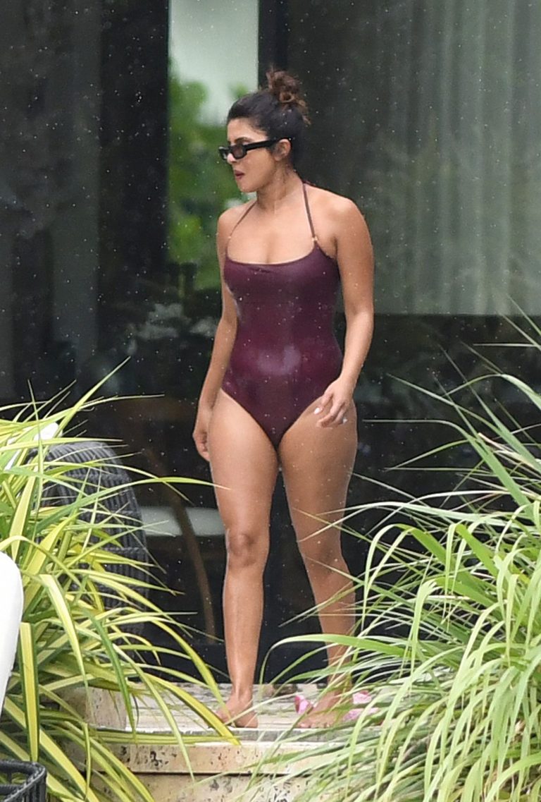 Priyanka Chopra Bikini Pictures Priyanka Chopra sexy tits in a wet swimsuit seen by paparazzi.