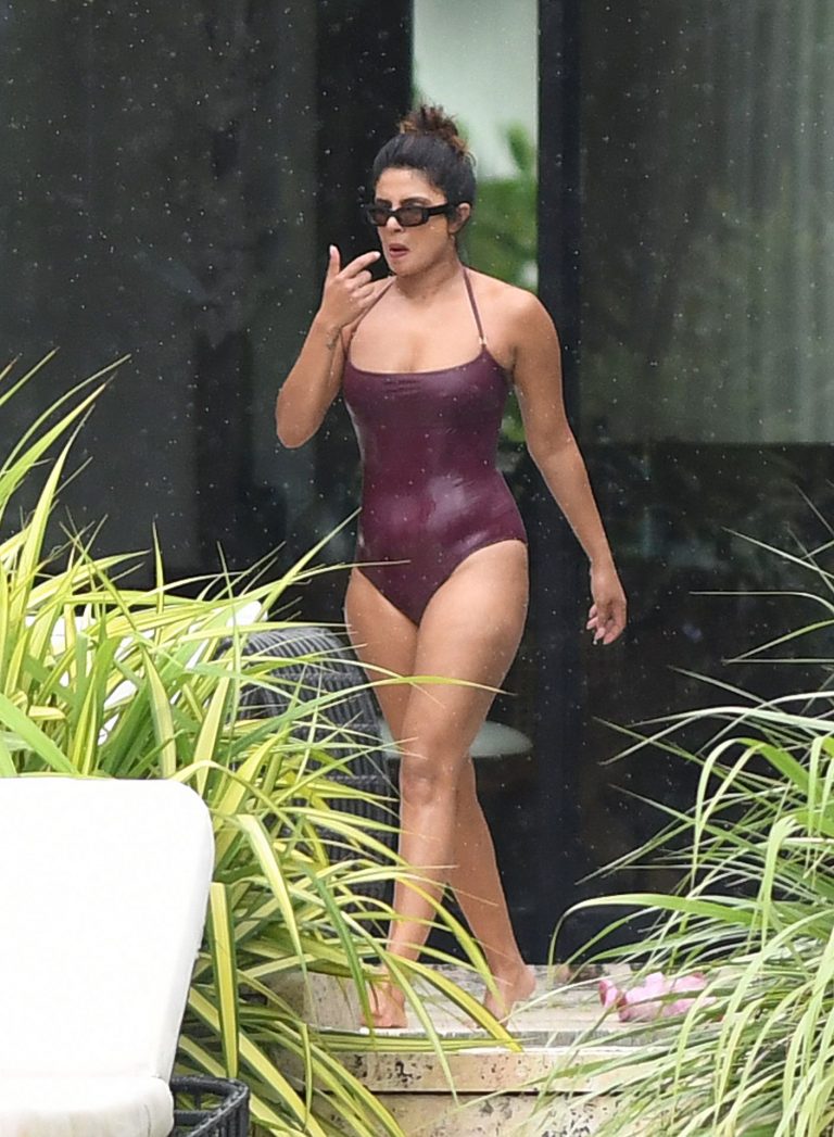 Priyanka Chopra Bikini Pictures Priyanka Chopra sexy tits in a wet swimsuit seen by paparazzi.