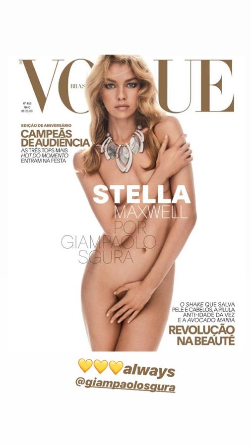 Stella Maxwell naked on the cover of Vogue covering her nude boobs with one arm and her pussy with her hand.







