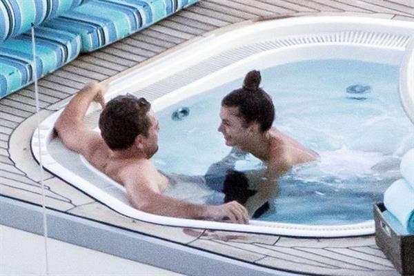 Camila Morrone in a sexy swimsuit in a hot tub on a yacht with Leonardo DiCaprio seen by paparazzi.










