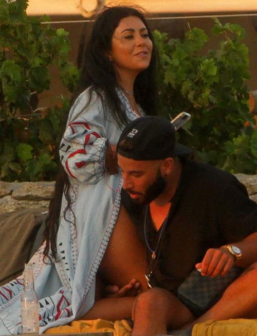 Martha Kalifatidis Bikini Pictures Martha Kalifatidis sexy in a bikini showing her ass and nice cleavage seen by paparazzi.