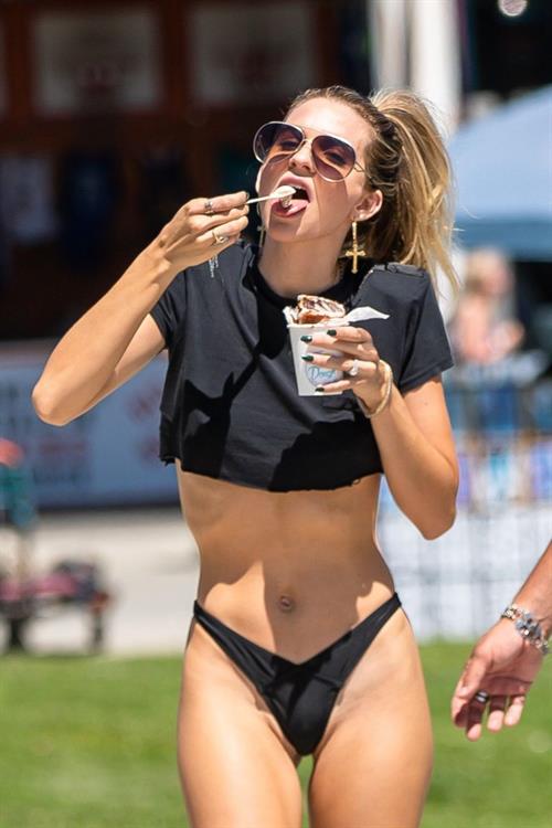Rachel McCord Pictures Rachel McCord nip slip boobs flash and sexy ass in thong bikini bottoms seen by paparazzi.