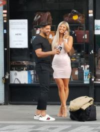 Belle Hassan wardrobe malfunction as the ass of her dress rips she had to call someone to sew it seen by paparazzi.




