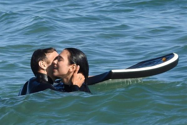 Dua Lipa sexy ass and cleavage in a swimsuit at the beach seen with her boyfriend by paparazzi.













