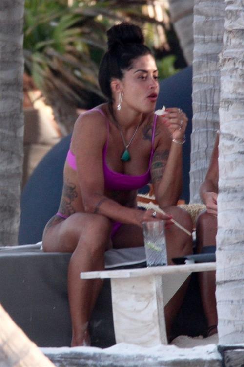 Aline Riscado Bikini Pictures Aline Riscado seen at the beach by paparazzi in a sexy ass thong bikini showing nice cleavage.