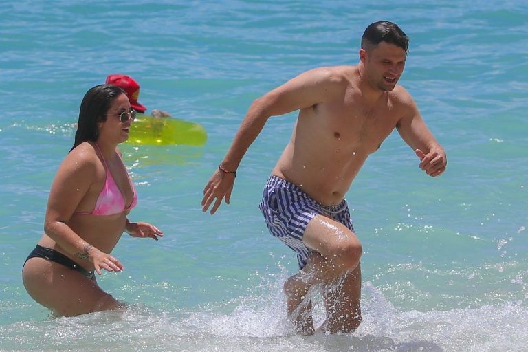 Stassi Schroeder and Katie Maloney-Schwartz sexy at the beach seen by paparazzi in a bikini and a swimsuit showing nice cleavage.