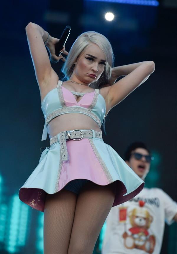 Kim Petras upskirt on stage singing and showing her panties.







