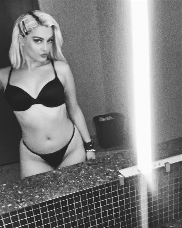 Bebe Rexha sexy black lingerie in a bra and thong panties.























