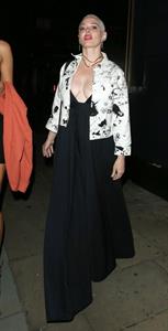 Rose McGowan braless boobs showing nice cleavage in a low cut dress with Lottie Moss seen by paparazzi. 
