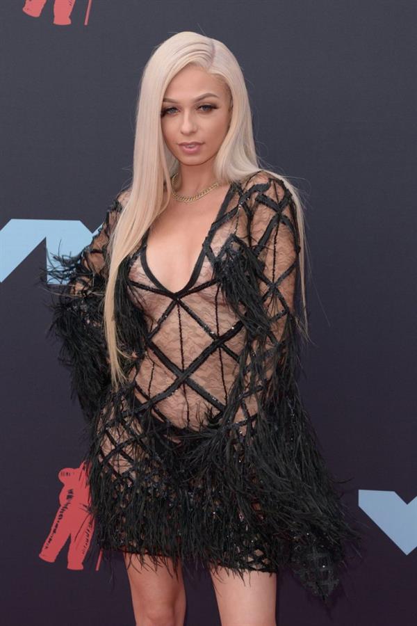 Mariahlynn braless boobs nip slips in a very revealing see through dress showing off her tits on the red carpet at the MTV VMA's seen by paparazzi.













