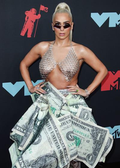 Veronica Vega showing off her braless boobs on the red carpet at the MTV VMA's in a see through top.















