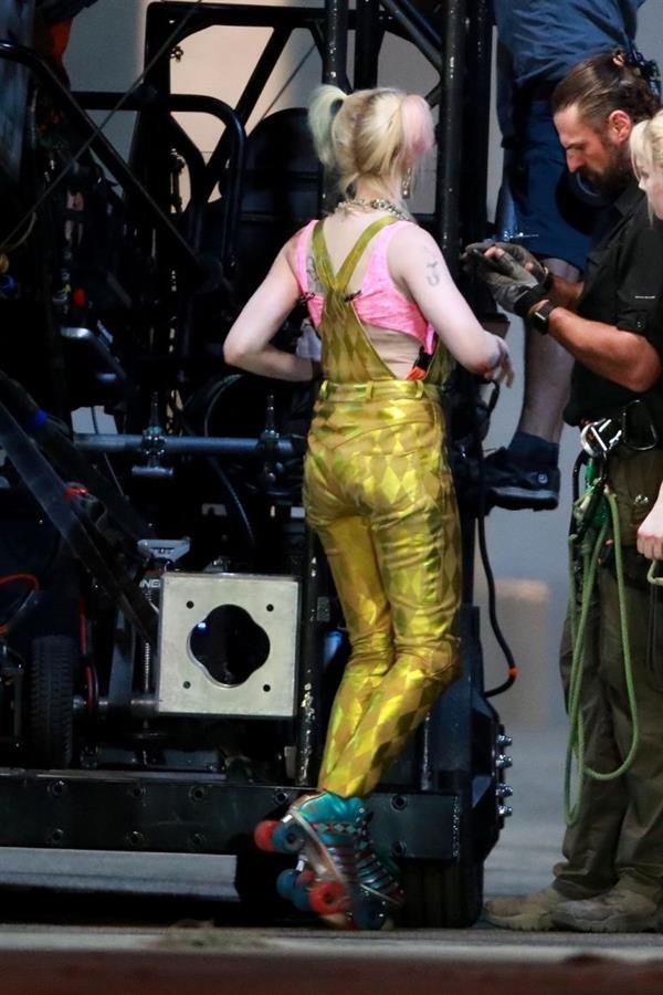 Margot Robbie sexy filming an action scene as Harley Quinn in the new movie  Birds of Prey .

















