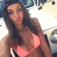 Rachel Cook in a bikini taking a selfie
